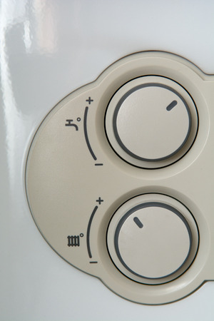 Temperature control dial for central heating at homeの写真素材