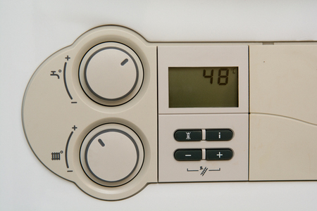 Temperature control dial for central heating at homeの写真素材