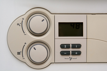 Temperature control dial for central heating at homeの写真素材