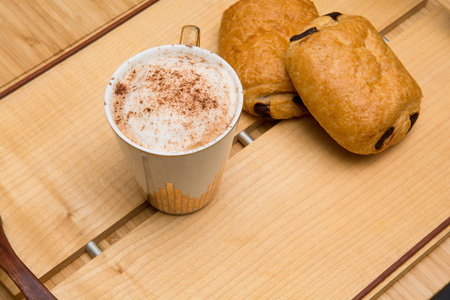 Light morning breakfast with croissant and coffeeの写真素材