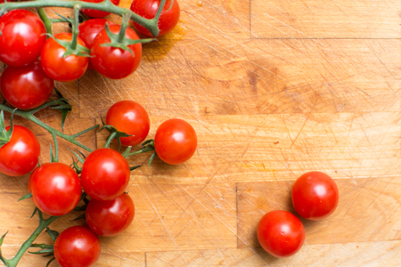 Fresh and ripe vine tomatoes, tomato on the vineの写真素材
