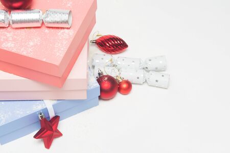 Luxury Christmas gifts in boxes with festive decorationsの写真素材