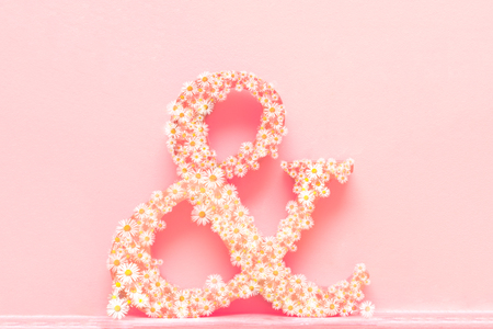 Love concept of ampersand sign to symbolise relationshipの写真素材