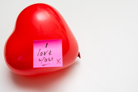 Love message for Valentines hand written note on a heart shape balloonの写真素材