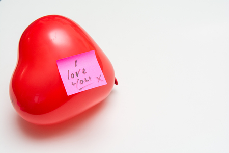 Love message for Valentines hand written note on a heart shape balloonの写真素材