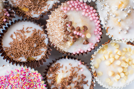 Home made cupcakes baked and decorated by kidsの写真素材