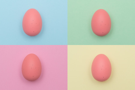 Easter eggs on pastel color background for Easter celebrationの写真素材