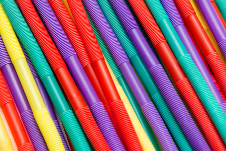 Bright colour drinking straws for party backgroundの写真素材