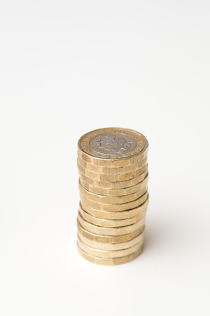 Coins isolated on white background, UK currencyの写真素材