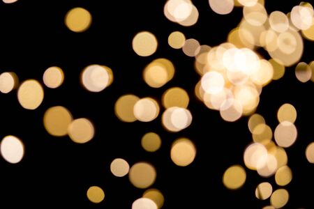 Abstract blurred lights with black backgroundの写真素材