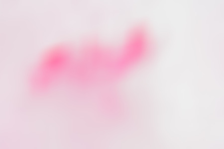 Pink abstract blur background from paint in waterの写真素材