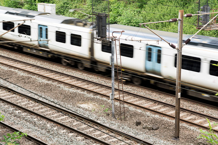 Moving train on the tracks, train is in motionの写真素材
