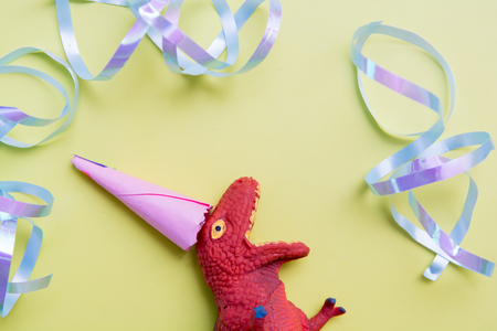 Funny dinosaur party time greeting cardの写真素材