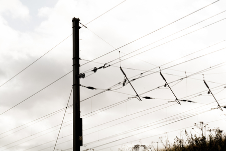 Overhead power lines on the railway trackの写真素材
