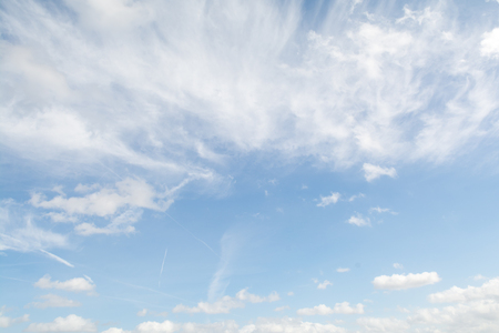 Empty sky with fluffy white cloudの写真素材