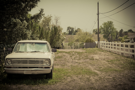 Vintage american pick up truck in vintage style landscapeの写真素材
