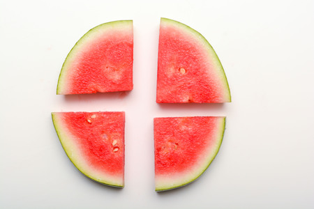 Watermelon isolated on white. Sliced fresh melon peicesの写真素材