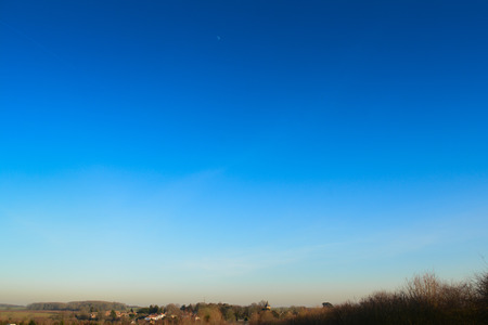 Landscape view with very low angle horizon and lots of copy space in skyの写真素材
