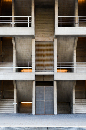 Urban building, modern building, symmetrical image of concrete stair wellの写真素材