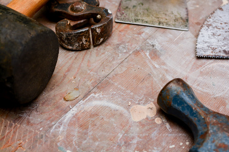 DIY work tools, used tools on a work benchの写真素材