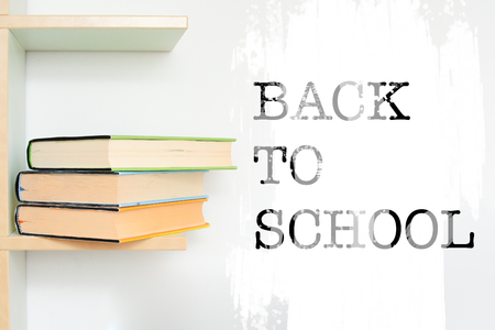 Back to school message written next to school booksの写真素材