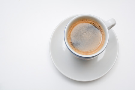 Strong espresso served in white cup and saucerの写真素材
