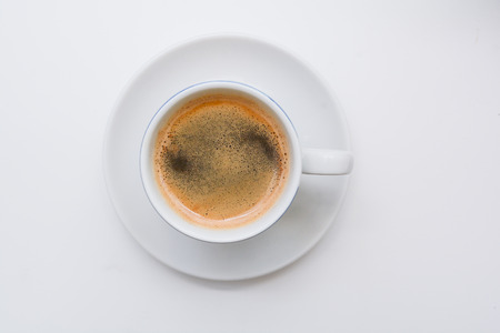 Strong espresso served in white cup and saucerの写真素材
