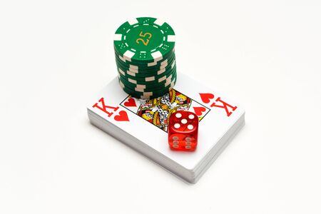 Casino objects playing cards dice casino chips isolated on white for playing chance and gambling gamesの写真素材