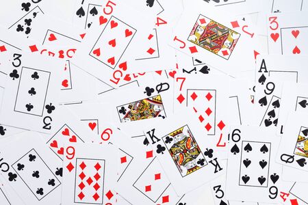 Deck of playing cards shuffled at random shot from directly aboveの写真素材