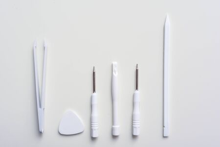 Tools for phone repair by mobile phone technician or to use to fix smartphone yourselfの写真素材