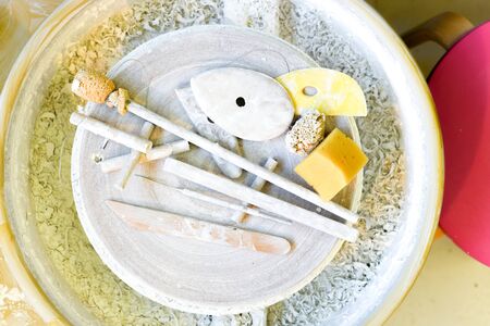 Pottery and ceramics tools for making art and sculpture in a workshopの写真素材