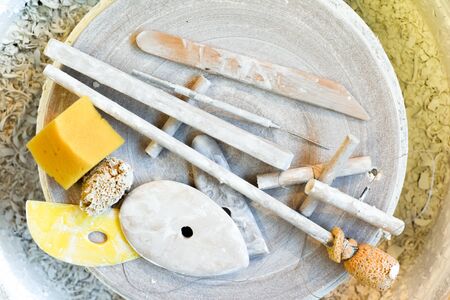 Pottery and ceramics tools for making art and sculpture in a workshopの写真素材