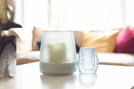 Coffee table in home interior with candle holder objectsの写真素材