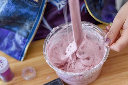 Kids have fun learning at home making slime in a creative science experiment