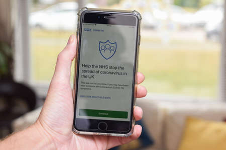 St Albans/ United Kingdom - 5 June 2020: NHS contact tracing app on a phone screen. The  app is due to be rolled out in englandのeditorial素材