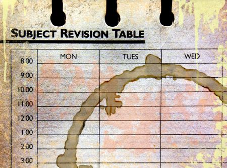 Subject revision table in grunge , which has been neglected and left empty - with complimentary coffee ring stain!の写真素材