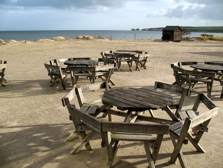 View of seashore with tables and eating areaの写真素材