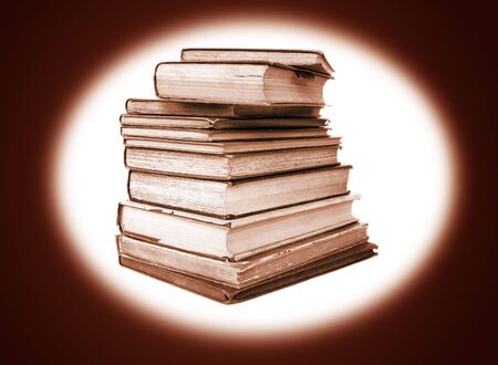 Pile of antiquarian books in sepia styleの写真素材