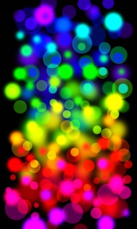 Rainbow of out of focus light - ideal background for christmas or celebration projectsの写真素材
