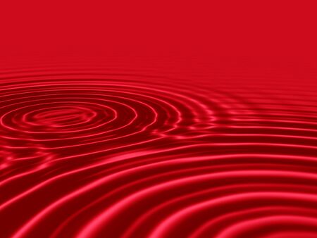 blood red liquid with rippled wavesの写真素材