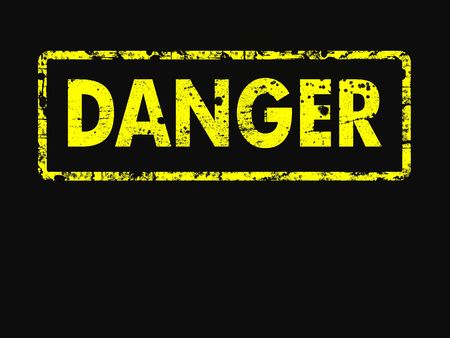 Yellow and black DANGER in a rubber stamp style. With copyspaceの写真素材