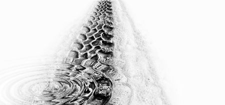 Tyre track and puddle ripplesの写真素材