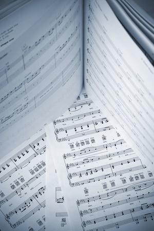 Book and papers with music notesの写真素材