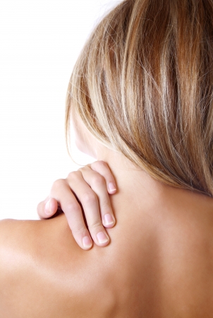 Woman holding her shoulder because of painの写真素材