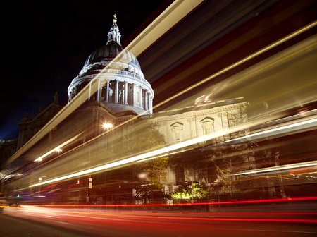 St Paul's cathedral with blurred bus trail at nightの写真素材