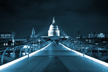 St Paul's cathedral and Milennium bridge London at nightの写真素材