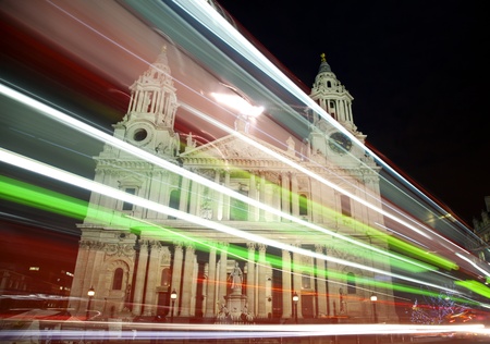 St Paul's cathedral with blurred bus trail at nightの写真素材
