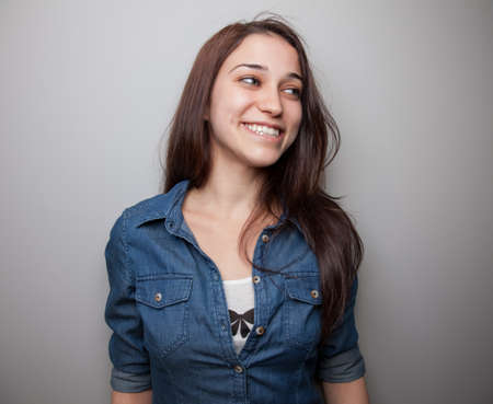 Portrait of a happy looking young woman の写真素材
