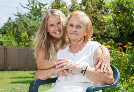 Providing care and support for elderly の写真素材