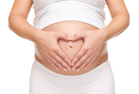 Pregnant woman loving her unborn babyの写真素材